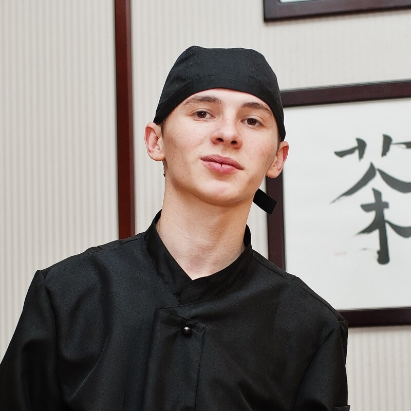 professional-chef-wear-in-black-with-sushi-and-rol-NZSW2BX.jpg